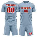 Custom Light Blue Orange Red Soccer Set